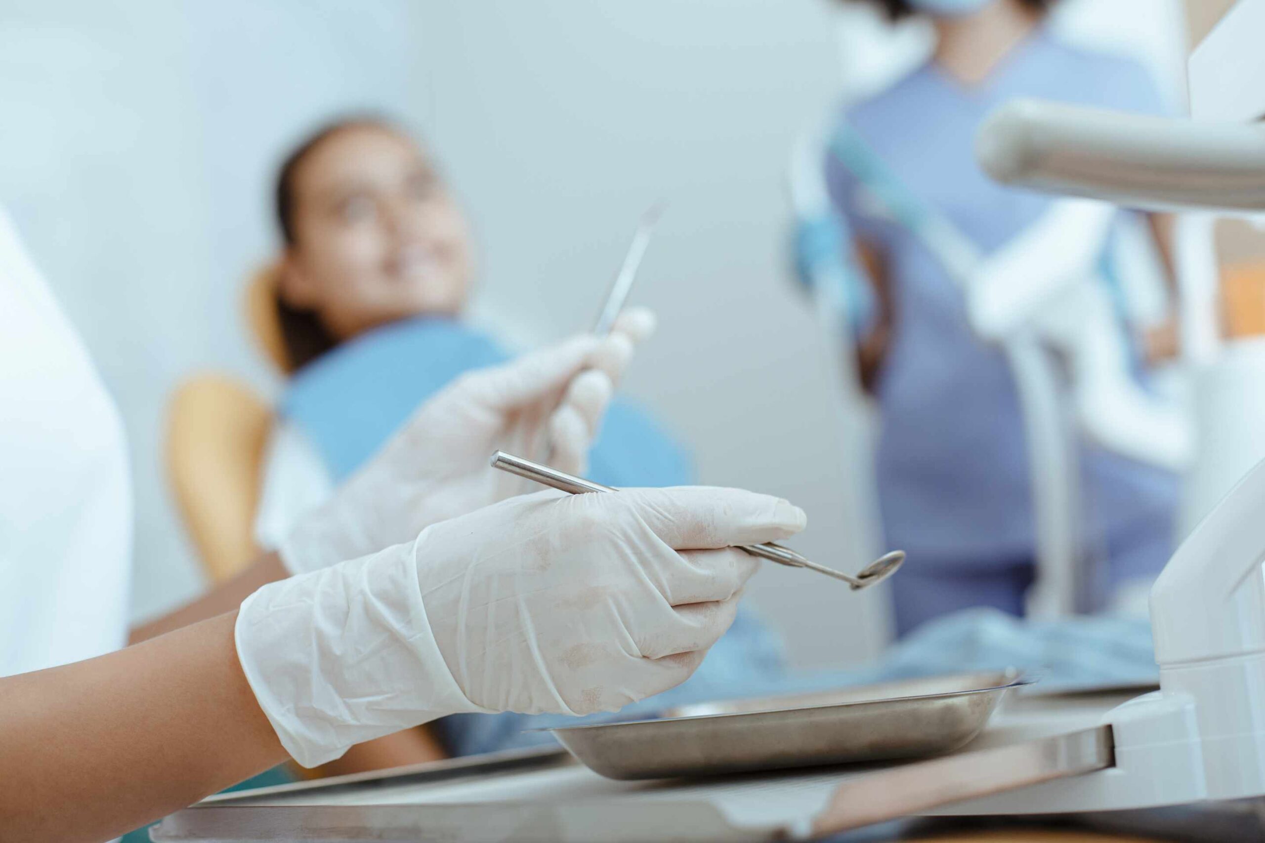 Dentist or orthodontist evaluating Invisalign treatment options for a patient seeking clear aligners